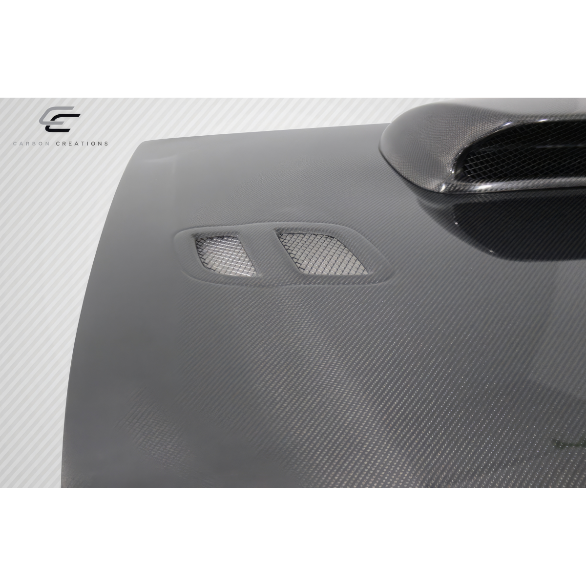 Modify your Subaru Impreza 1993 with our Exterior/Hoods - Angled view of carbon fiber hood part