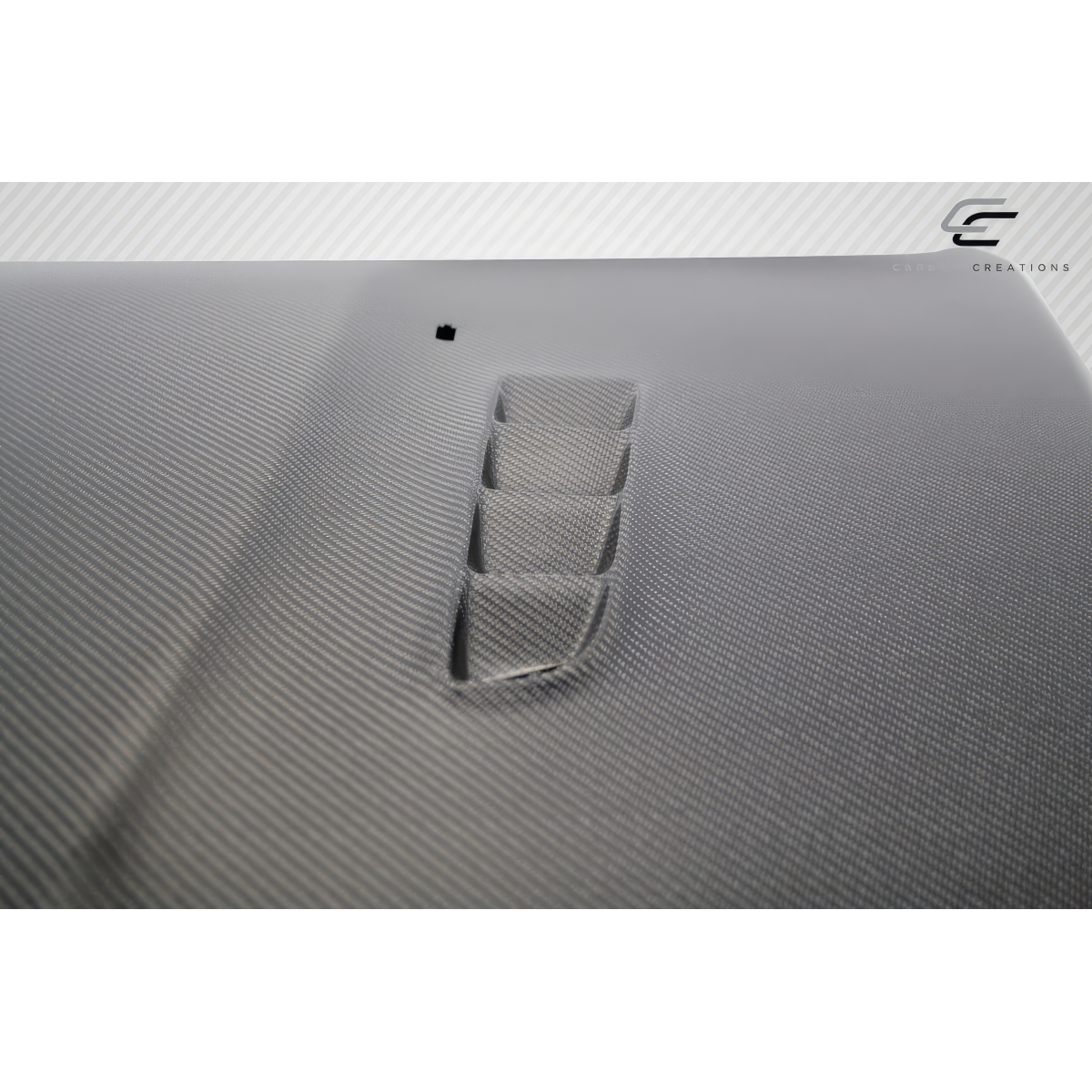 Modify your Ford Focus 2016 with our Exterior/Hoods - Angled view of carbon fiber hood part