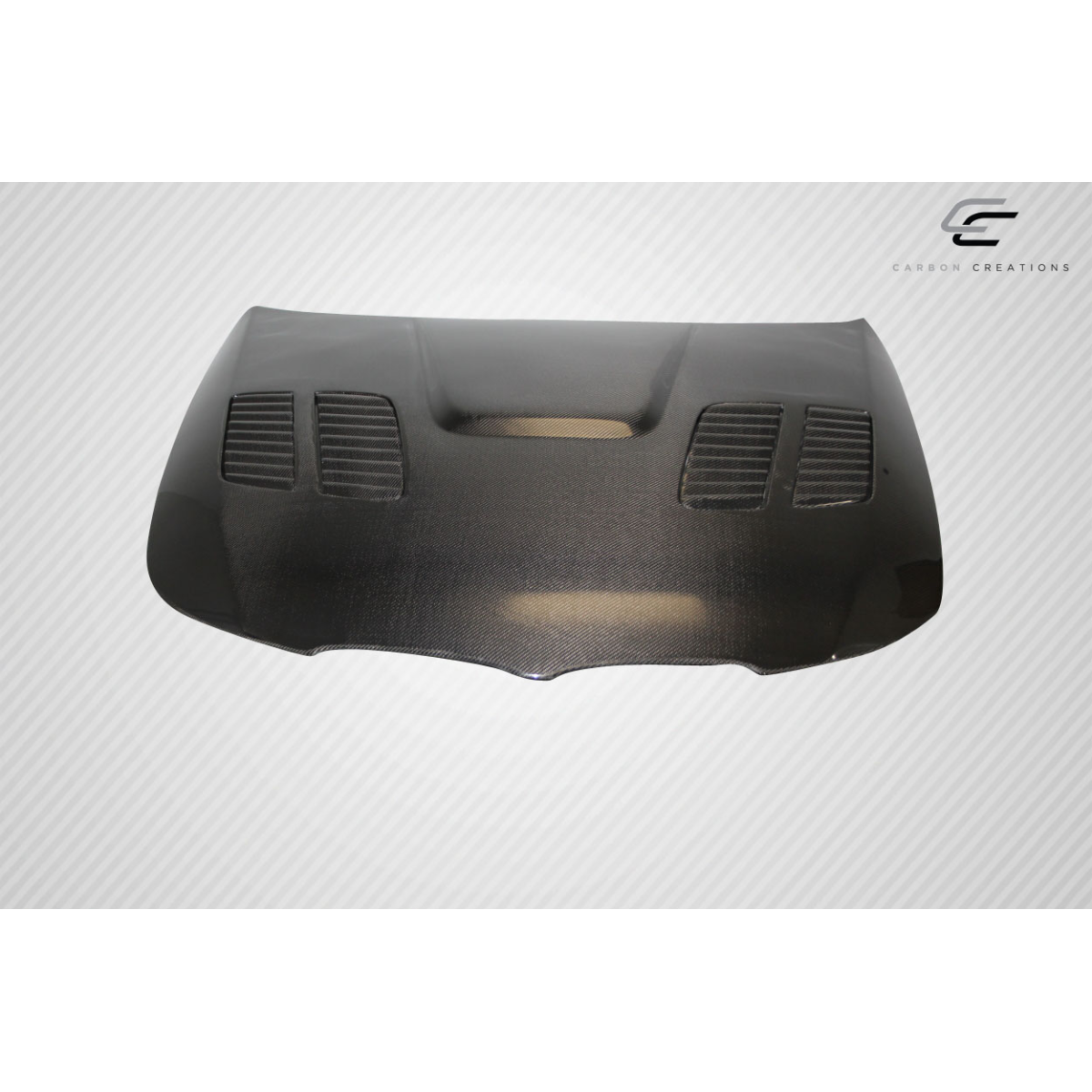 Modify your BMW 3-Series 2009 with our Exterior/Hoods - Front view of the carbon fiber hood