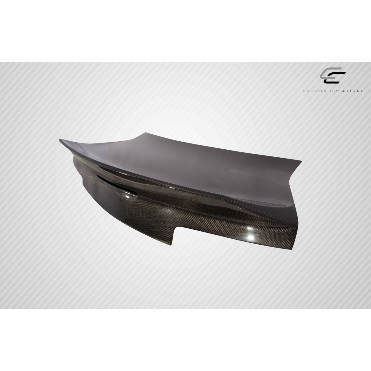 Modify your Chevrolet Camaro 2014 with our Exterior/Trunks - Part viewed at a side angle with smooth curves