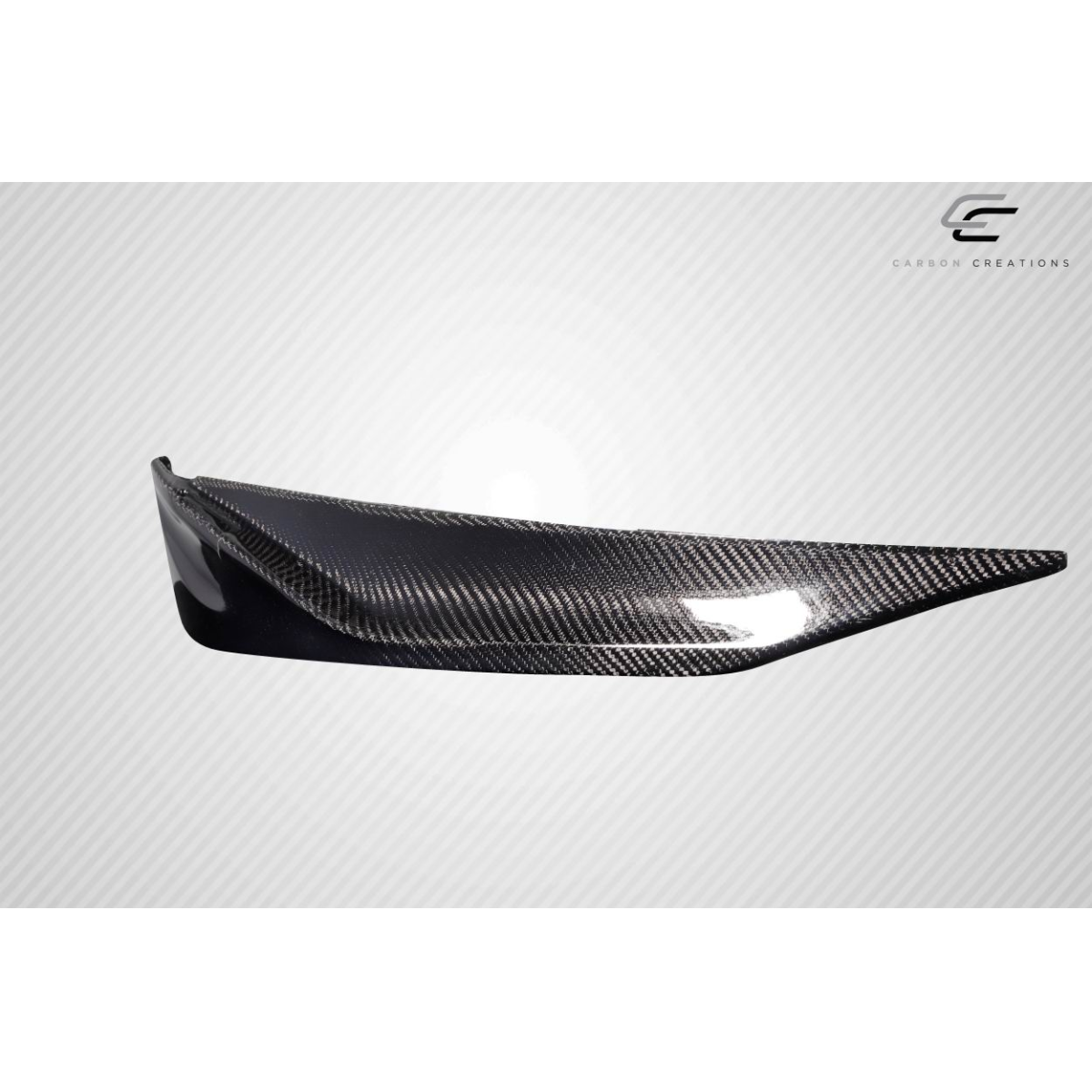 Modify your KIA Optima 2011 with our Exterior/Front Bumpers or Lips - Diagonal view of a carbon fiber front lip