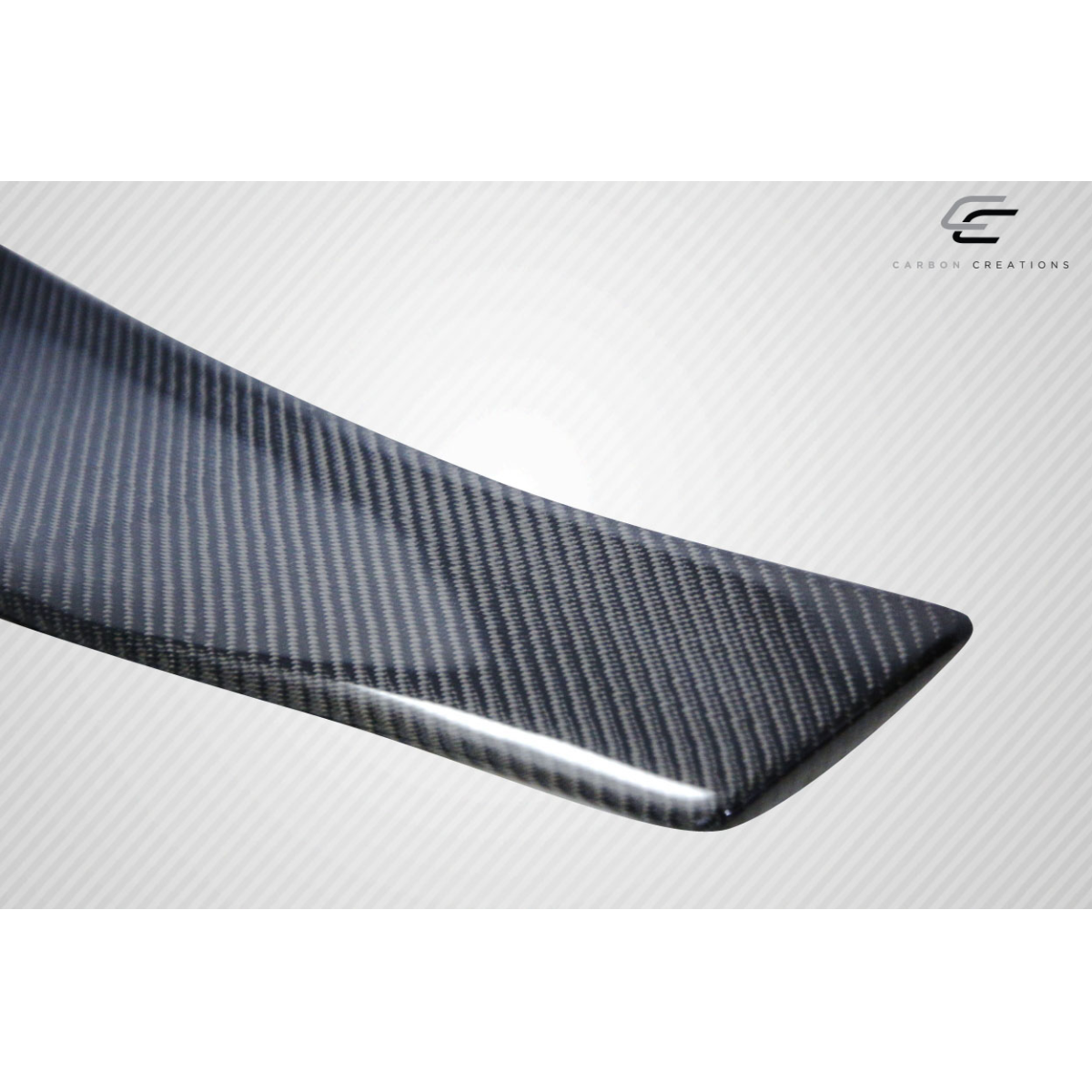 Modify your Mazda RX-8 2004 with our Exterior/Wings - Angled view of carbon fiber wing spoiler