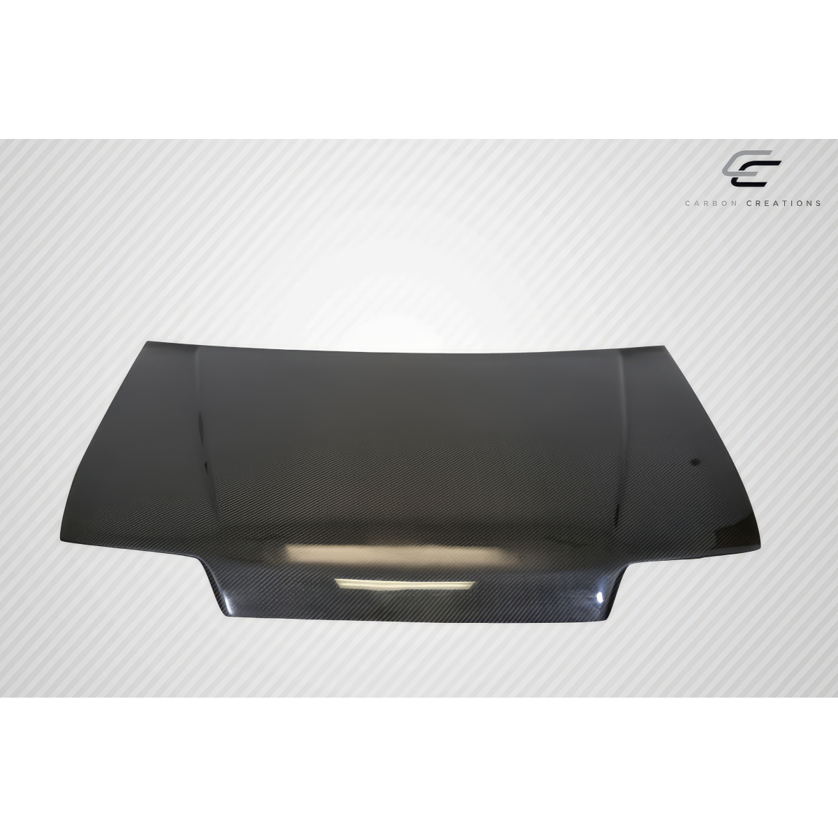 Modify your Honda Civic 1988 with our Exterior/Hoods - Angled view of carbon fiber hood part