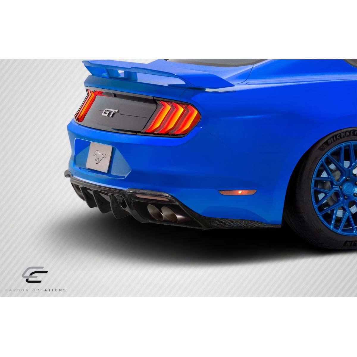 Modify your Ford Mustang 2018 with our Exterior/Diffusers - Angled view of the rear of the Mustang