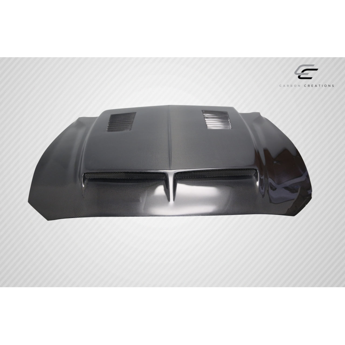 Modify your Ford Mustang 2018 with our Exterior/Hoods - Front view of carbon fiber hood at slight angle