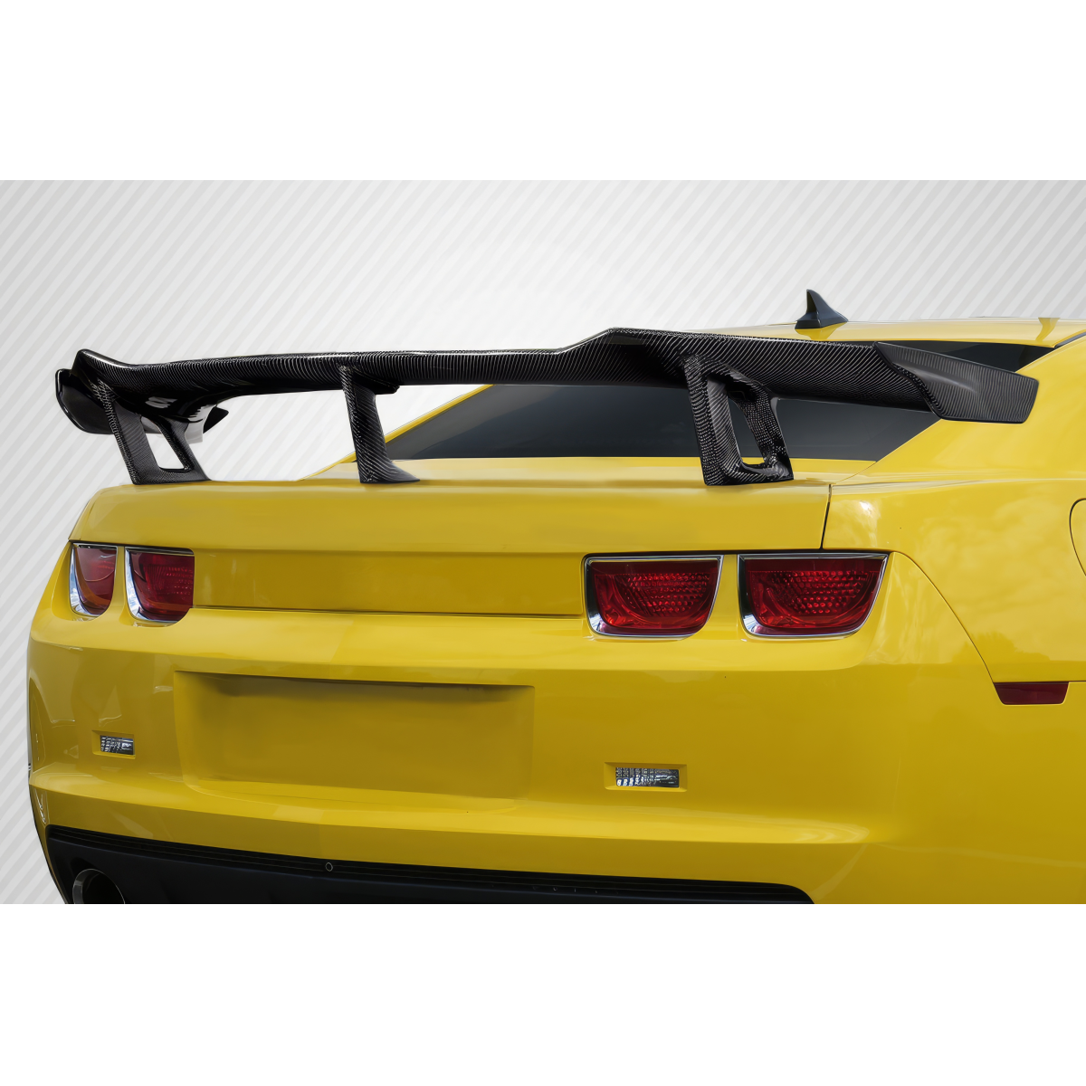 Modify your Chevrolet Camaro 2010 with our Exterior/Wings - Rear view angle of the car with wing