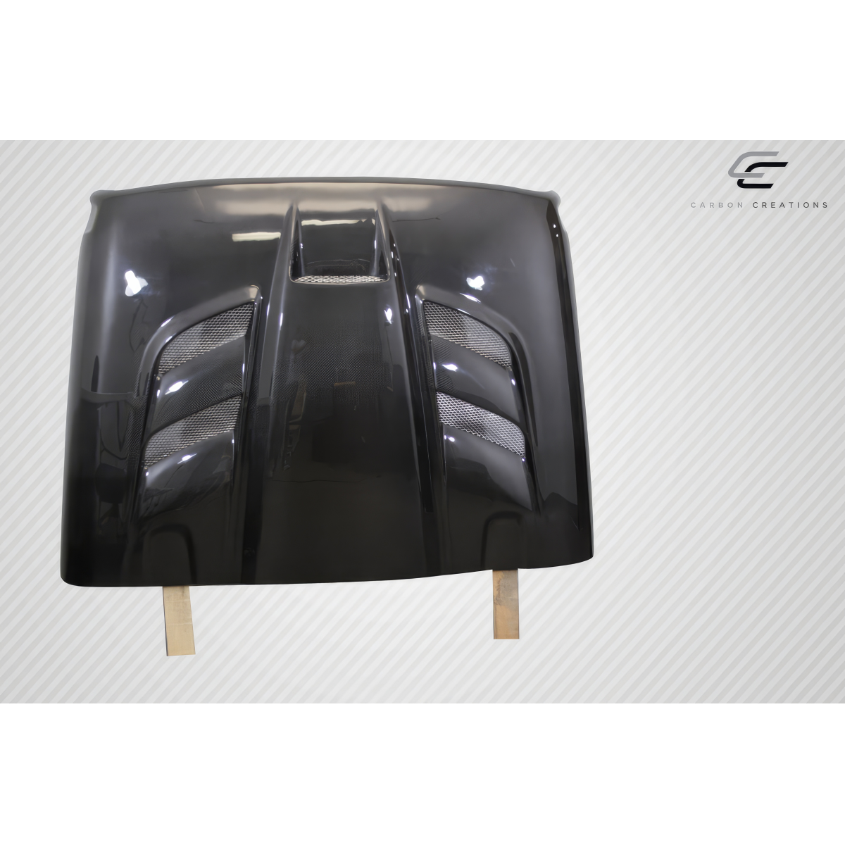 Modify your Jeep Gladiator 2019 with our Exterior/Hoods - Front view of a carbon fiber hood at a slight angle