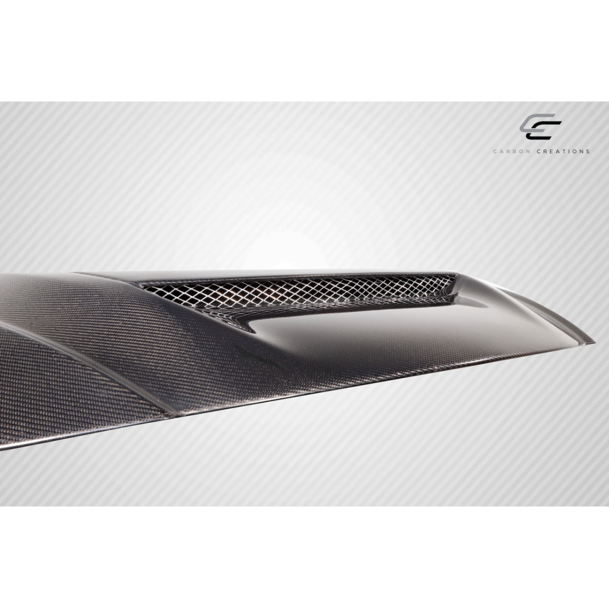 Modify your Mazda 3 2004 with our Exterior/Hoods - Part viewed at a slightly elevated angle