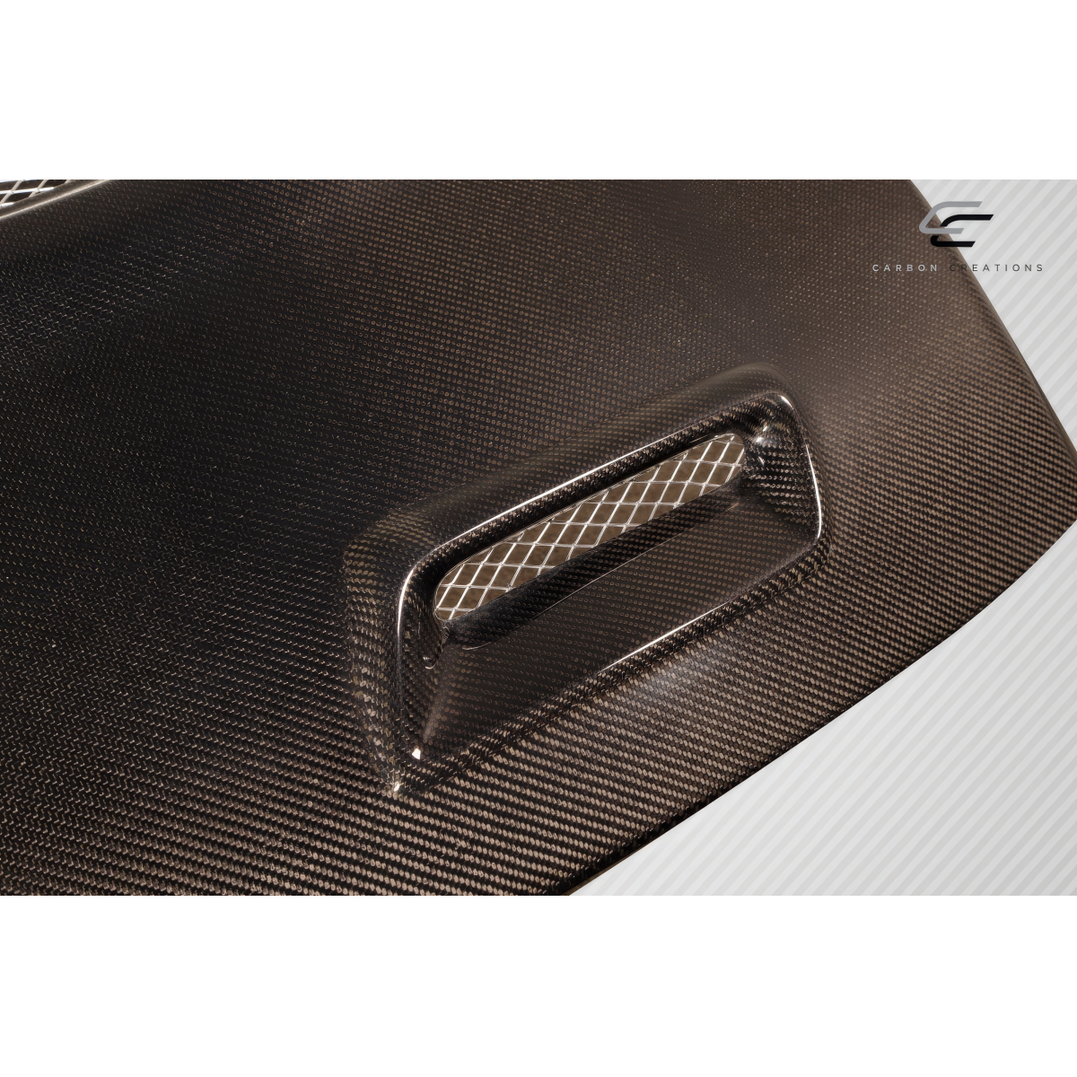 Modify your Mitsubishi Eclipse 2000 with our Exterior/Hoods - Angle shows a closeup of the carbon fiber hood