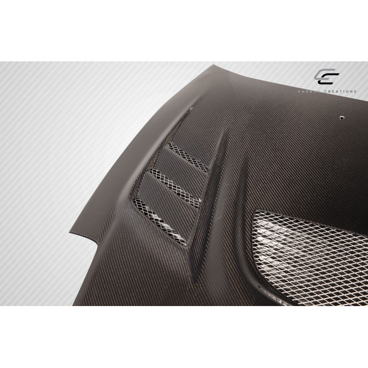 Modify your Mitsubishi Eclipse 2000 with our Exterior/Hoods - Angled view of carbon fiber hood part