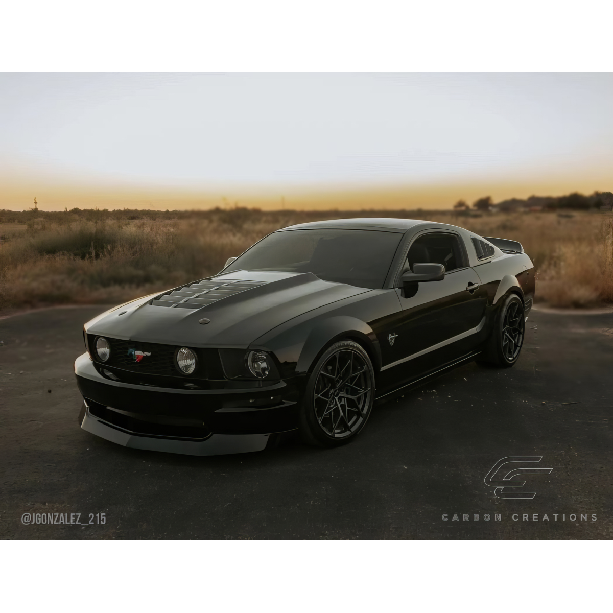 Modify your Ford Mustang 2005 with our Exterior/Hoods - Front three quarter view of the vehicle