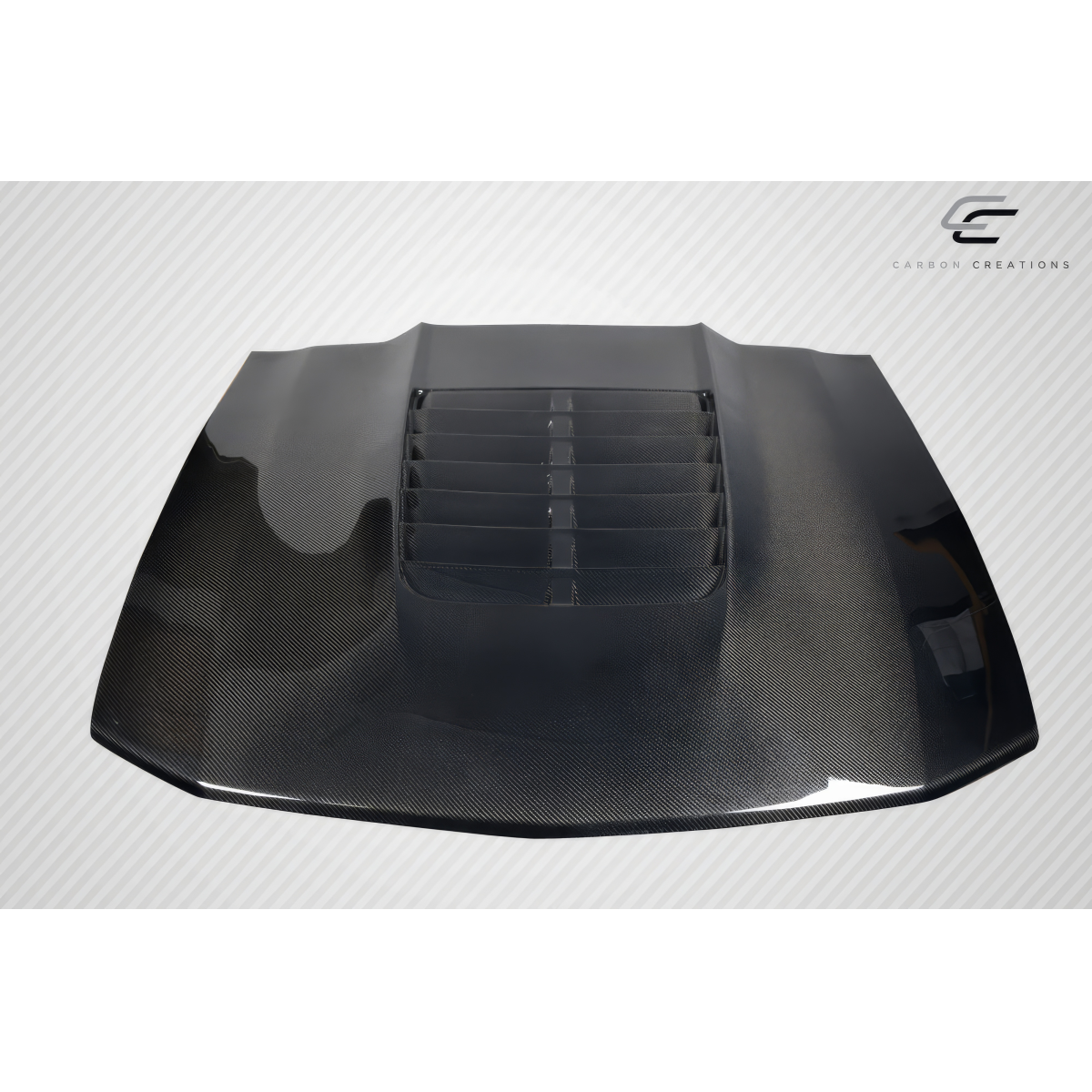 Modify your Ford Mustang 2005 with our Exterior/Hoods - Top angle view of carbon fiber hood part