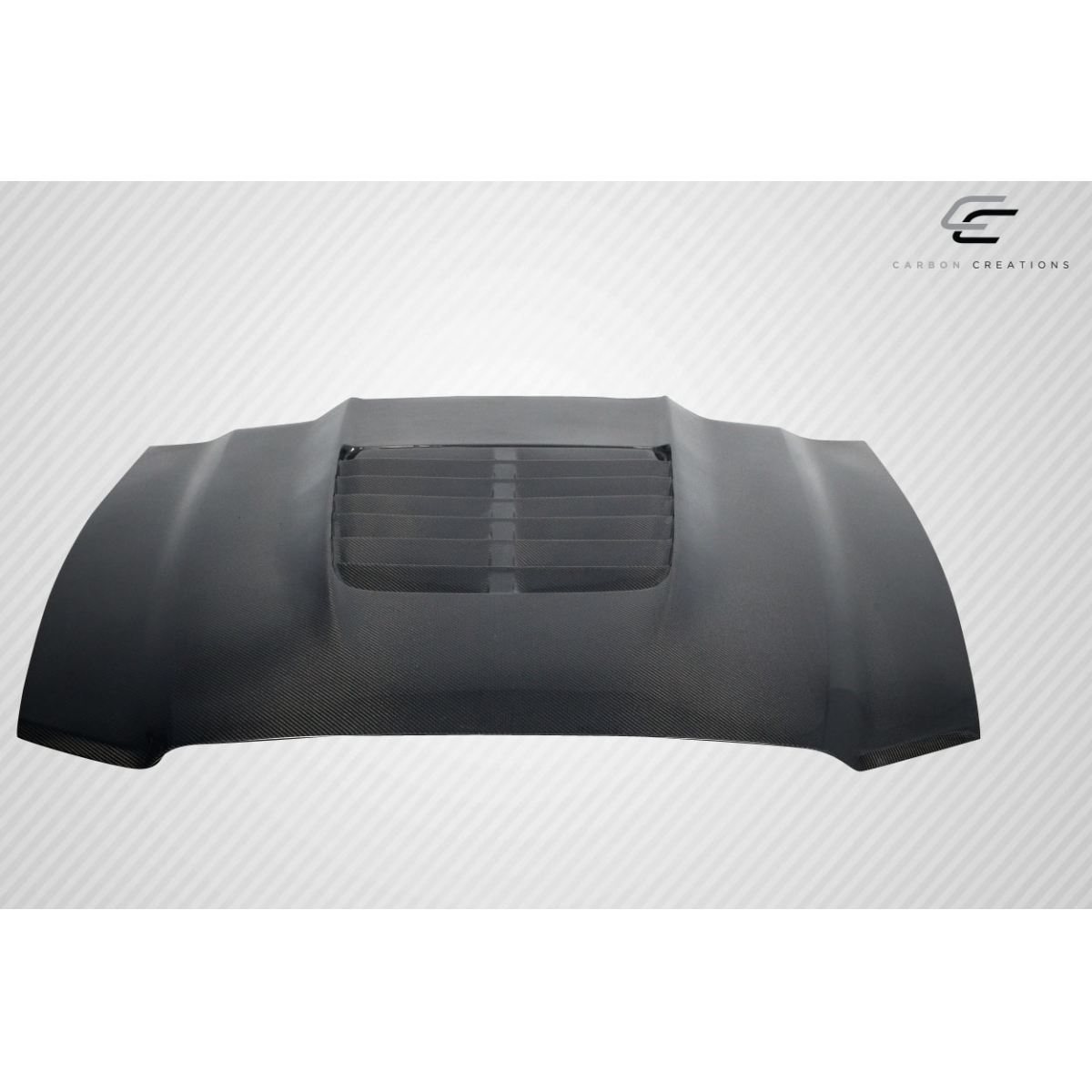 Modify your Ford Mustang 2013 with our Exterior/Hoods - Front view of carbon fiber hood at a slight angle