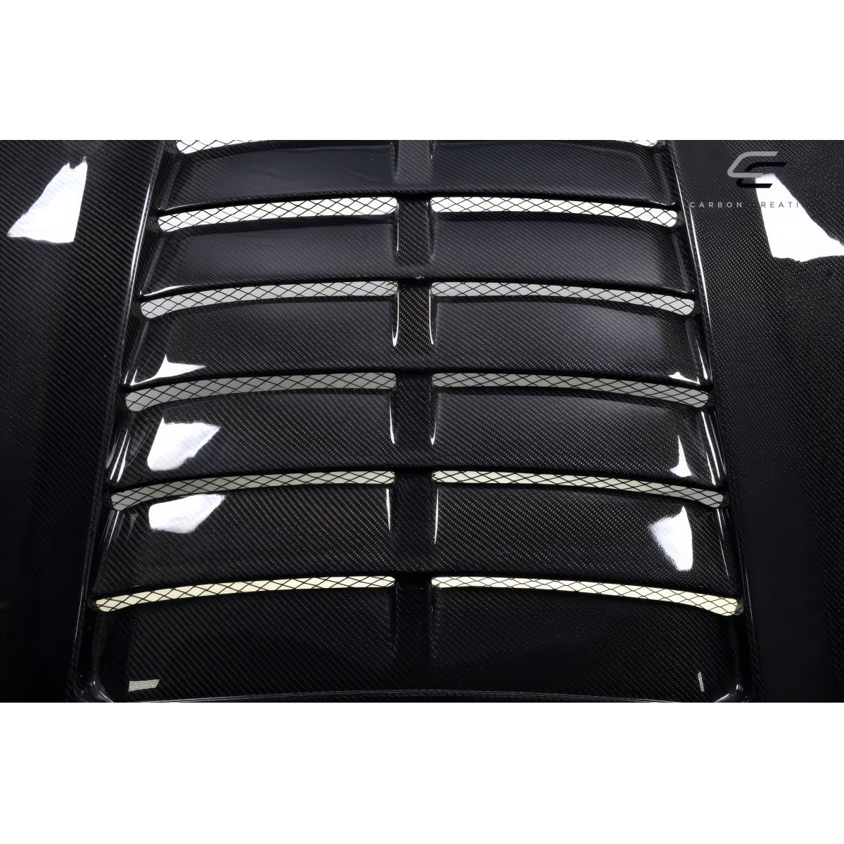 Modify your Ford Mustang 2015 with our Exterior/Hoods - Image shows carbon hood at a top angle