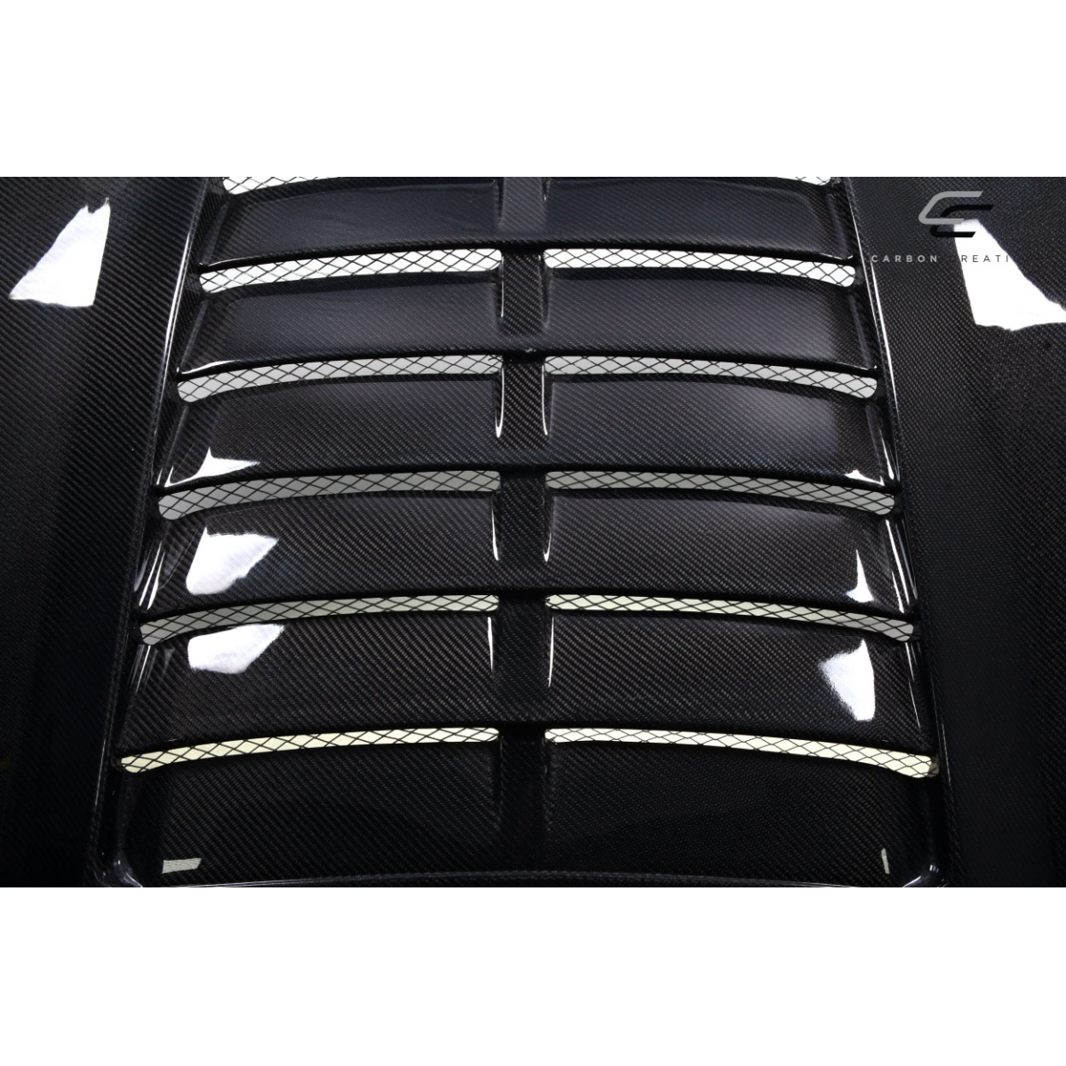 Modify your Ford Mustang 2015 with our Exterior/Hoods - Top down angle of a carbon fiber hood