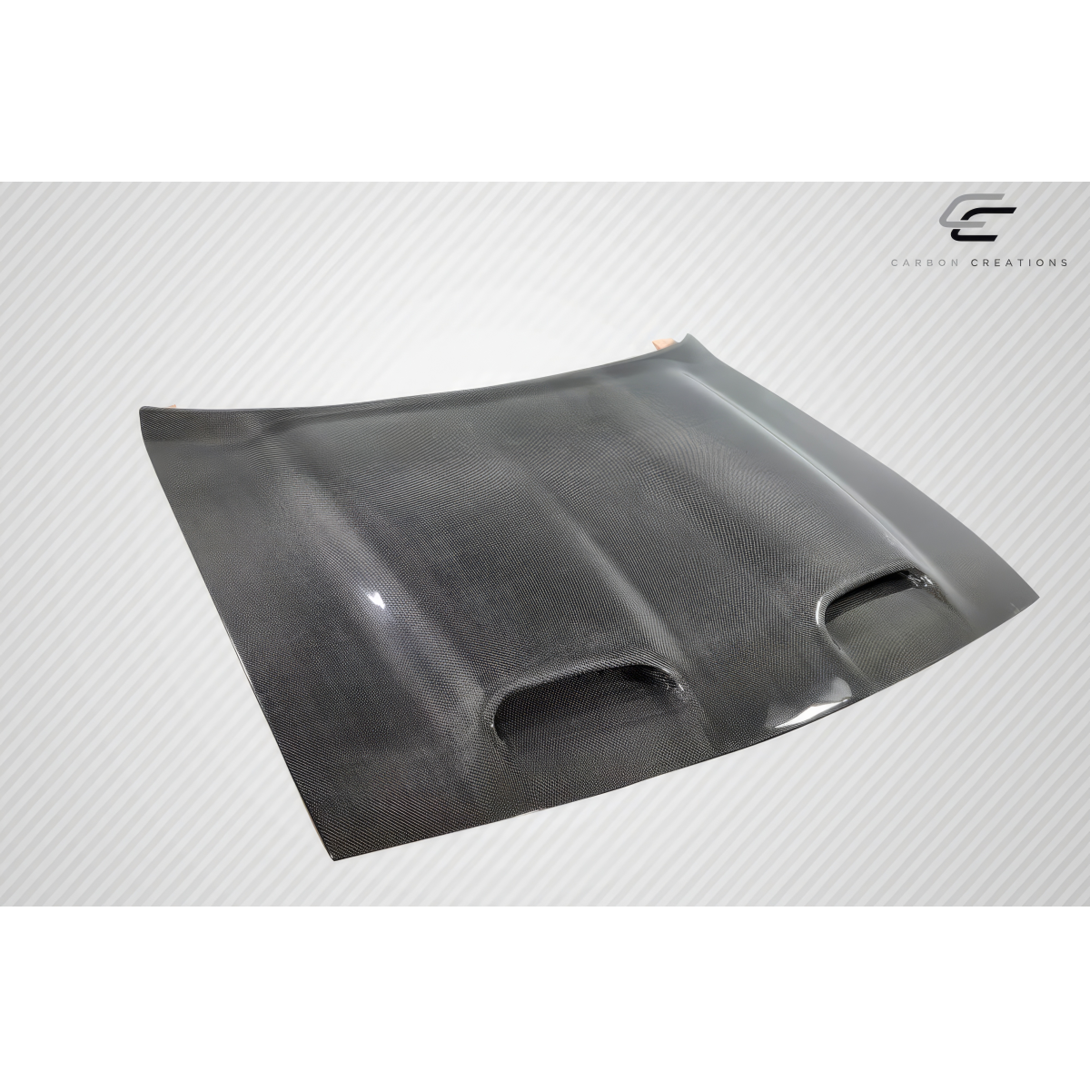 Modify your Dodge Challenger 2008 with our Exterior/Hoods - The image shows a carbon fiber hood at a frontal angle