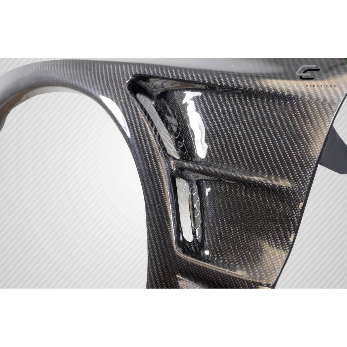 Modify your Mitsubishi Evolution 2003 with our Exterior/Fenders - Angled view showing carbon fiber fender design