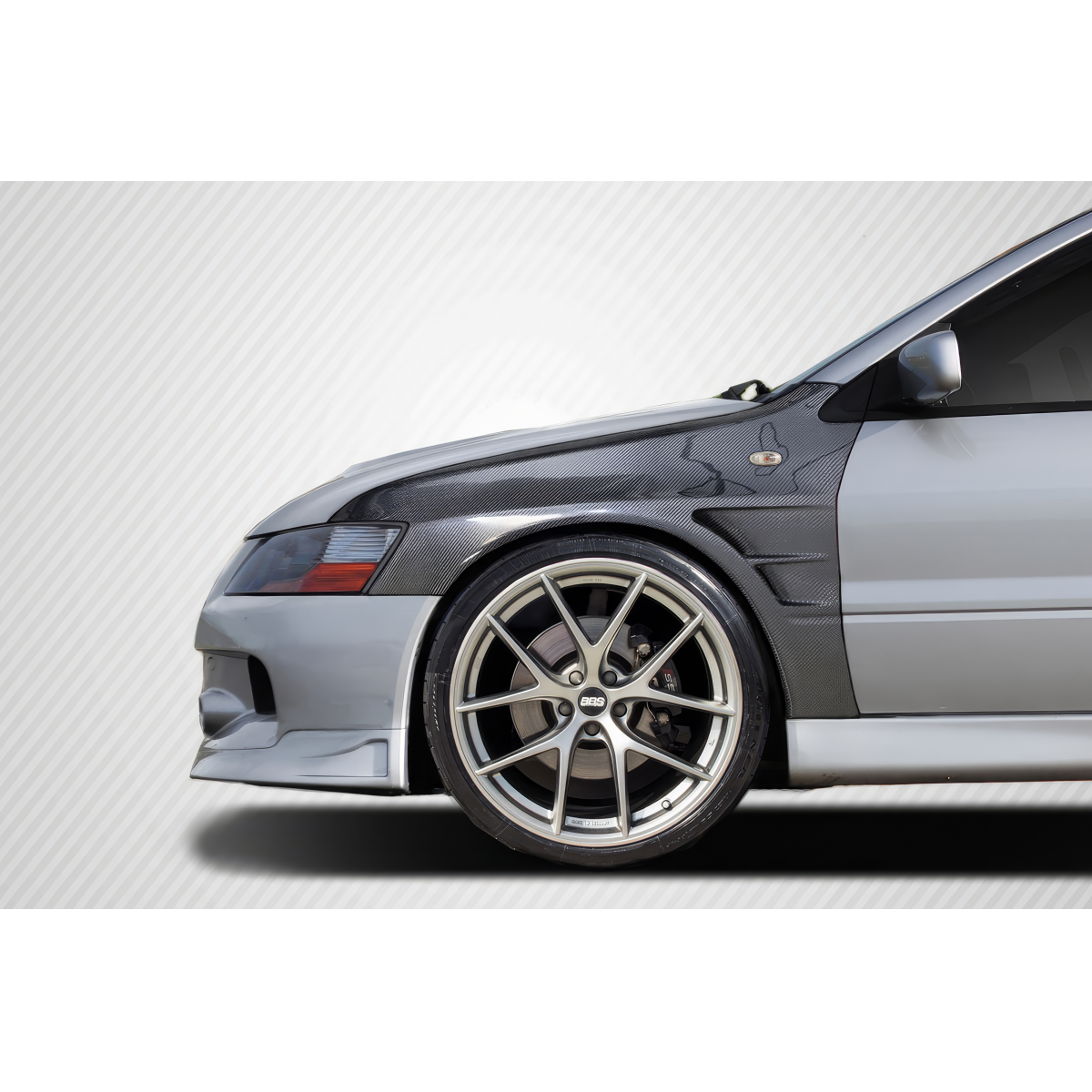 Modify your Mitsubishi Evolution 2003 with our Exterior/Fenders - View angle is front side profile