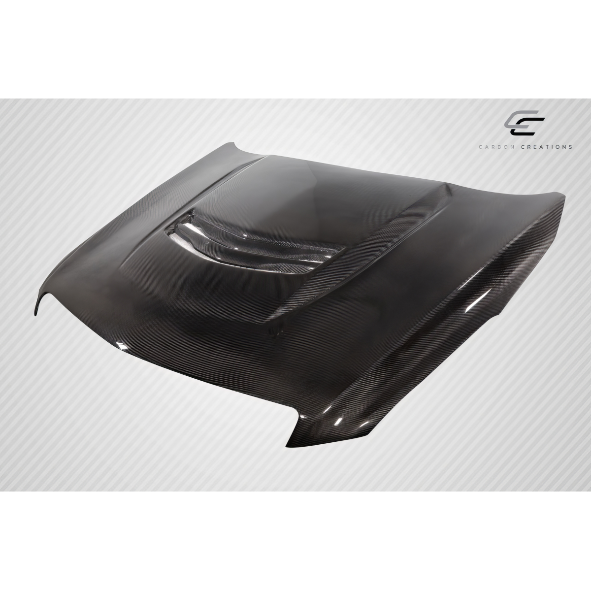 Modify your Cadillac ATS 2012 with our Exterior/Hoods - Top down angle showcasing carbon fiber hood