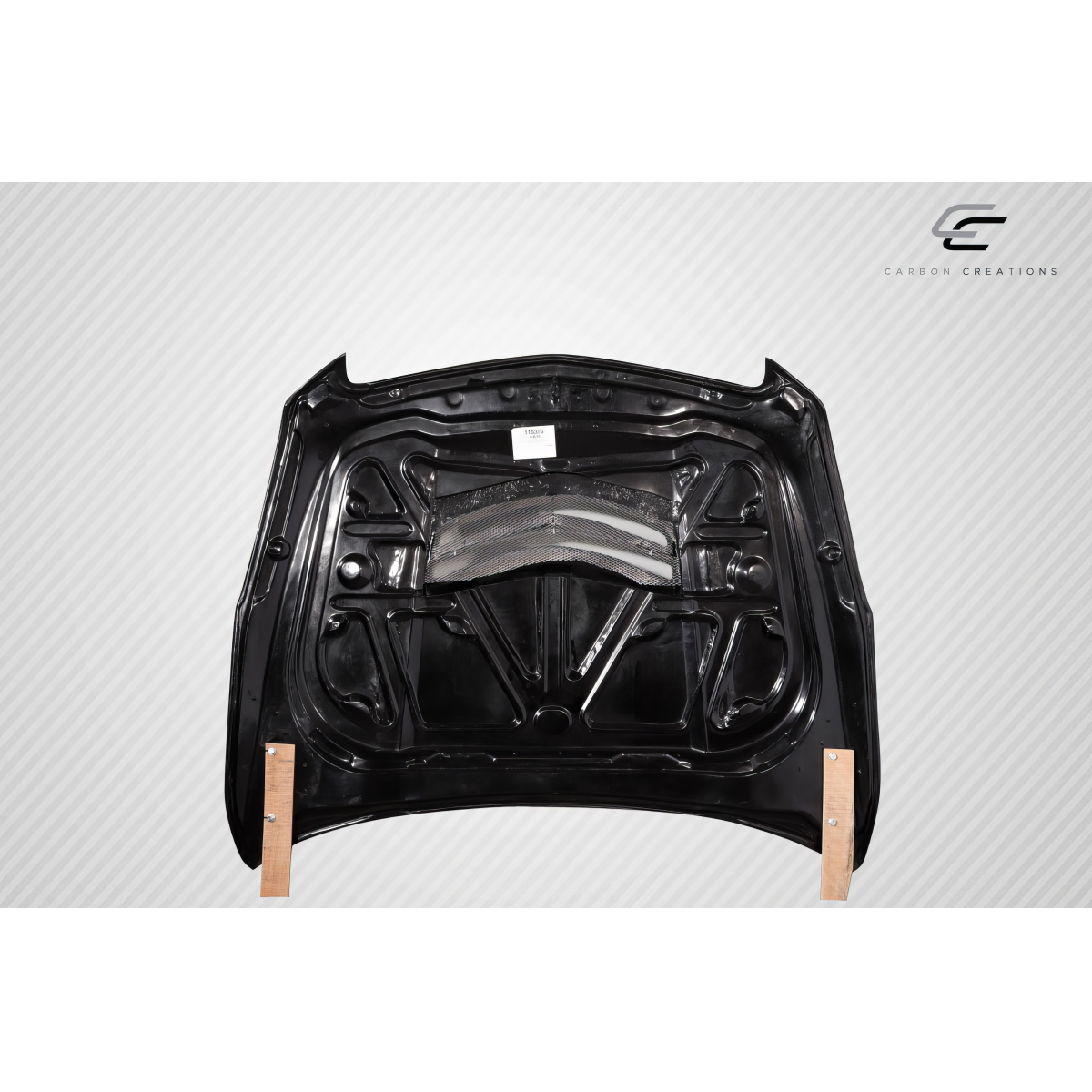 Modify your Cadillac ATS 2012 with our Exterior/Hoods - Top view of hood part laid flat on surface