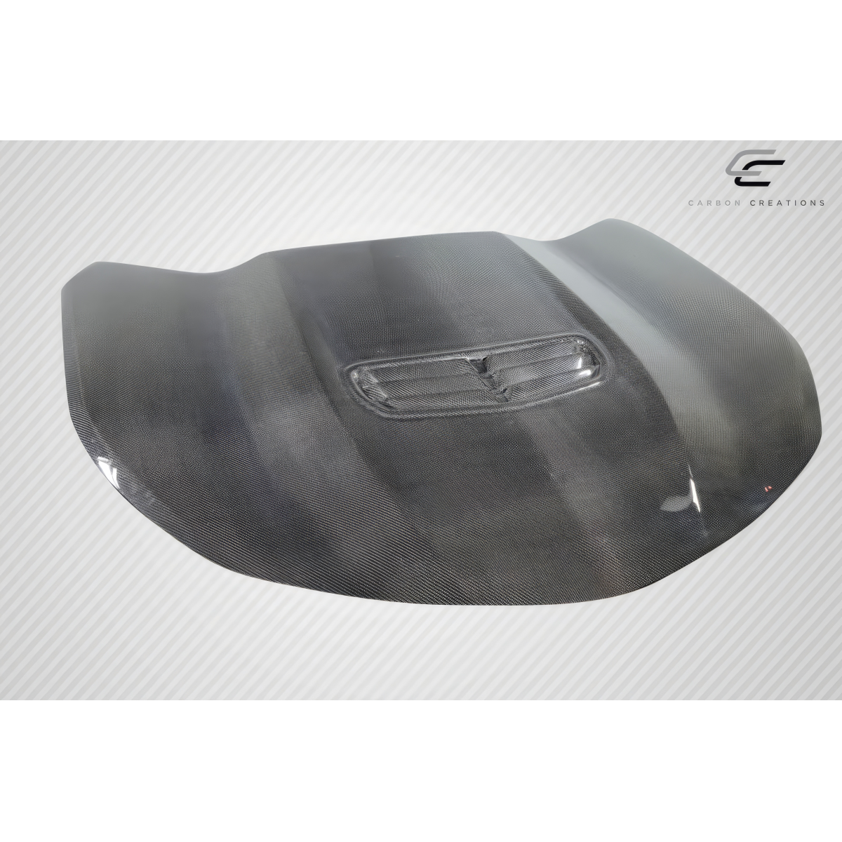 Modify your Chevrolet Camaro 2016 with our Exterior/Hoods - Angled view of the carbon fiber hood part