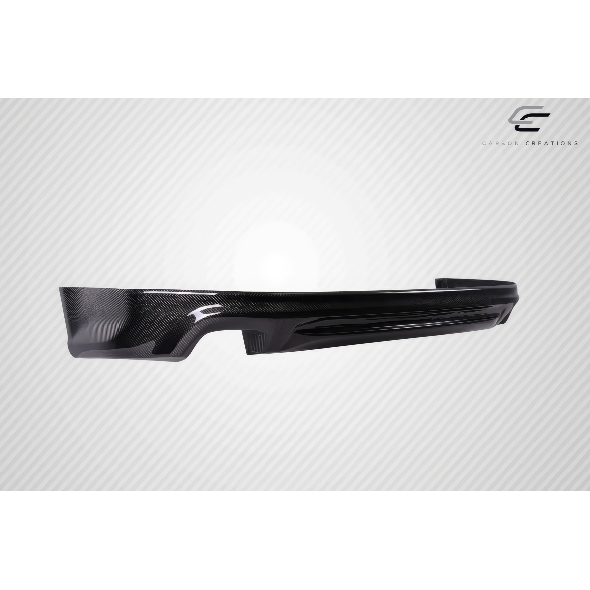 Modify your Acura TL 2004 with our Exterior/Rear Lips - Side angle view of rear lip for Acura TL