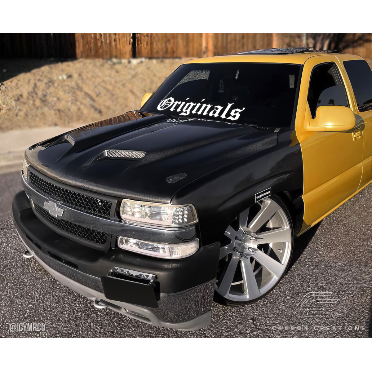 Modify your Chevrolet Silverado 1999 with our Exterior/Hoods - Front three quarter angle view of the vehicle