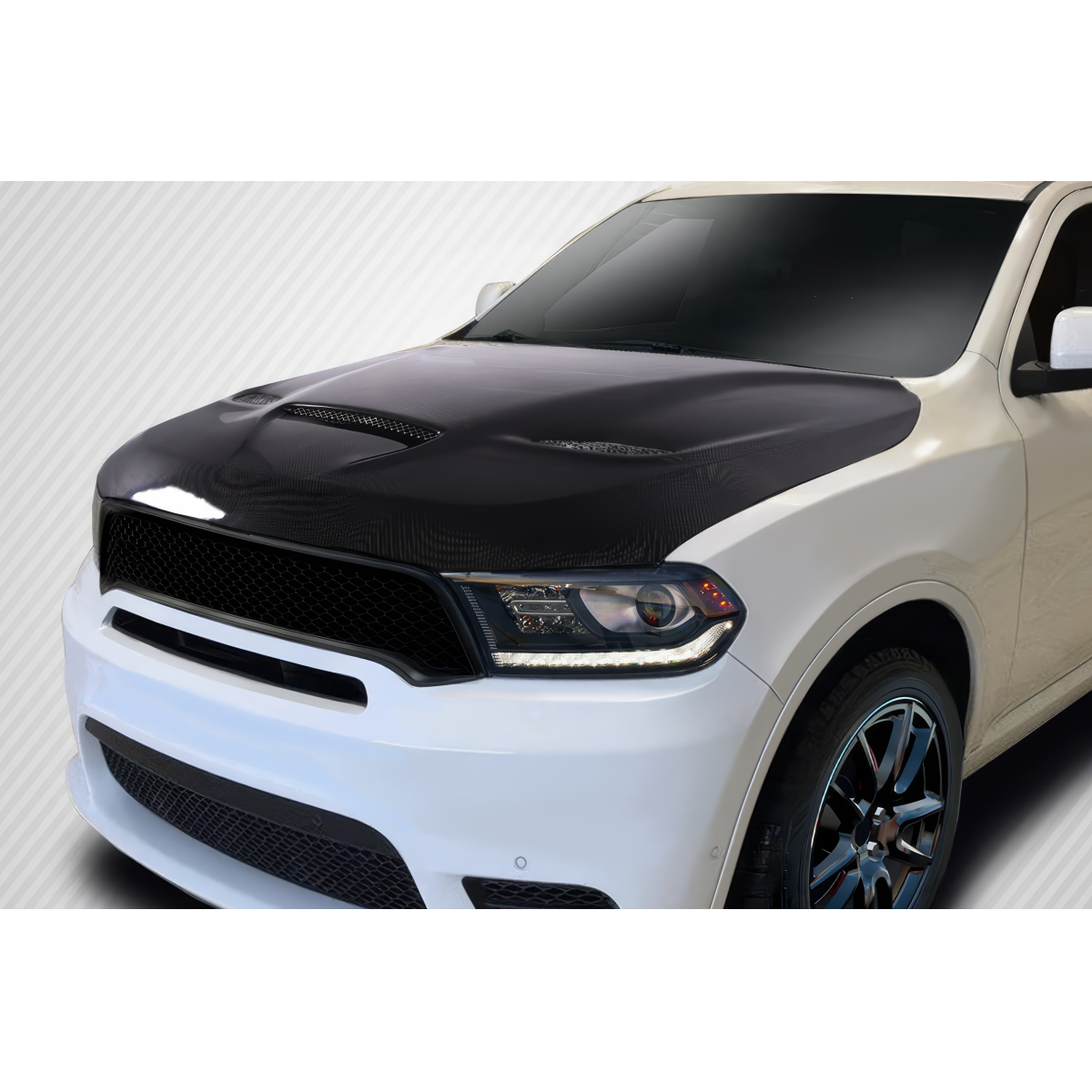 Modify your Dodge Durango 2011 with our Exterior/Hoods - Front angle view of hood on white Dodge Durango