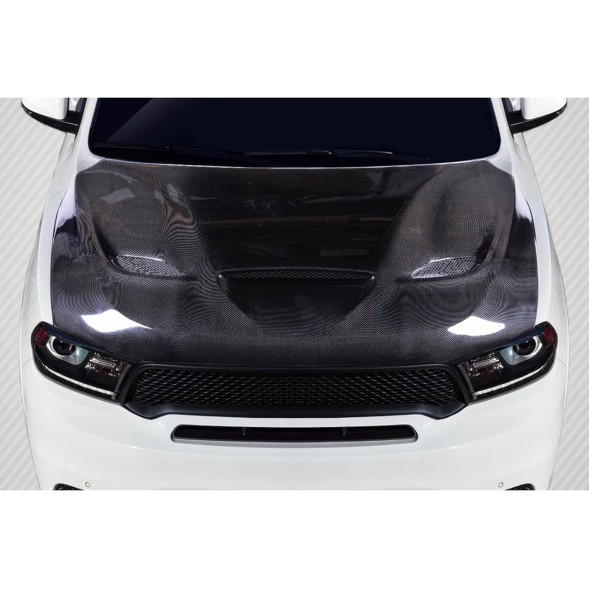 Modify your Dodge Durango 2011 with our Exterior/Hoods - Top down view of carbon fiber hood on Dodge Durango