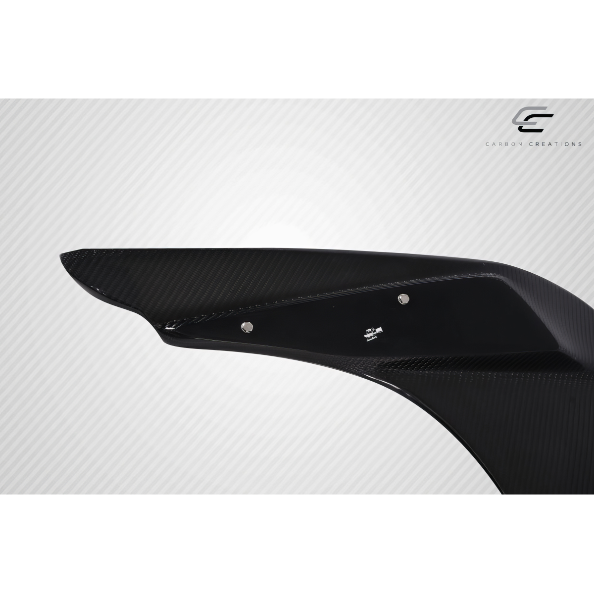 Modify your Ford Mustang 1999 with our Exterior/Wings - Angled view of carbon fiber rear wing spoiler