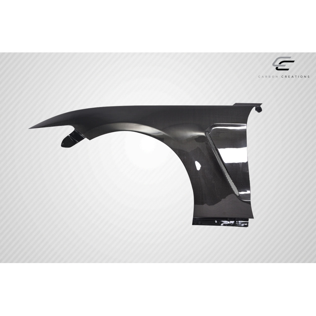 Modify your Ford Mustang 2015 with our Exterior/Fenders - Angled side view of carbon fiber fender