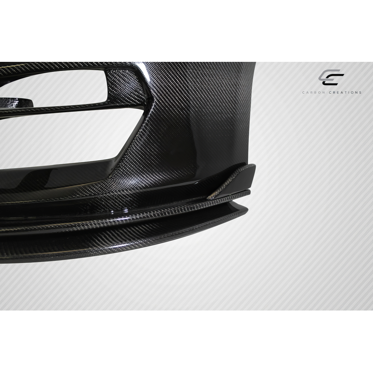 Modify your Ford Mustang 2015 with our Exterior/Front Bumpers or Lips - Angled view of a carbon fiber front bumper