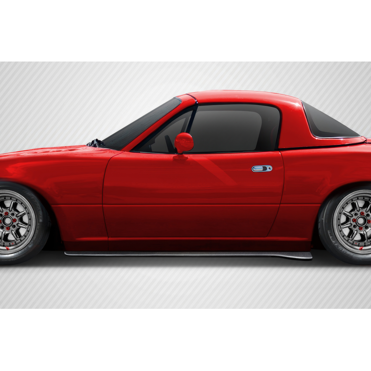 Modify your Mazda Miata 1990 with our Exterior/Other Exterior - Side view of the car at a slight angle