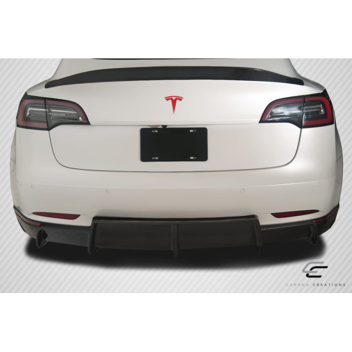 Modify your Tesla 3 2018 with our Exterior/Complete Body Kits - Rear view of vehicle with carbon fiber body kit