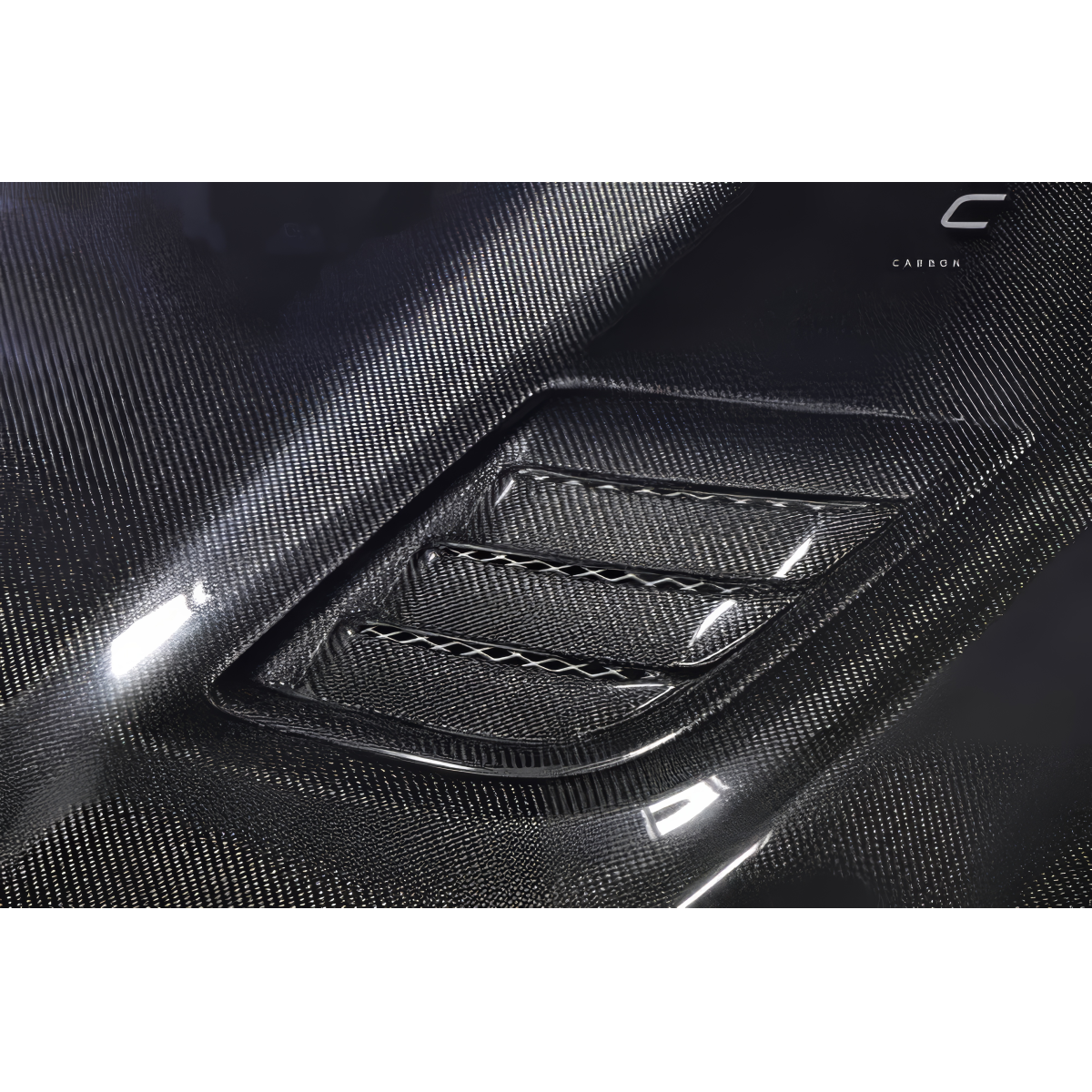 Modify your Dodge Ram 2019 with our Exterior/Hoods - Close up angled view of carbon fiber hood part