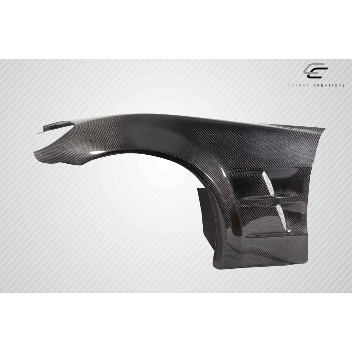 Modify your Chevrolet Corvette 2005 with our Exterior/Fenders - Angled view of carbon fiber fender for Corvette