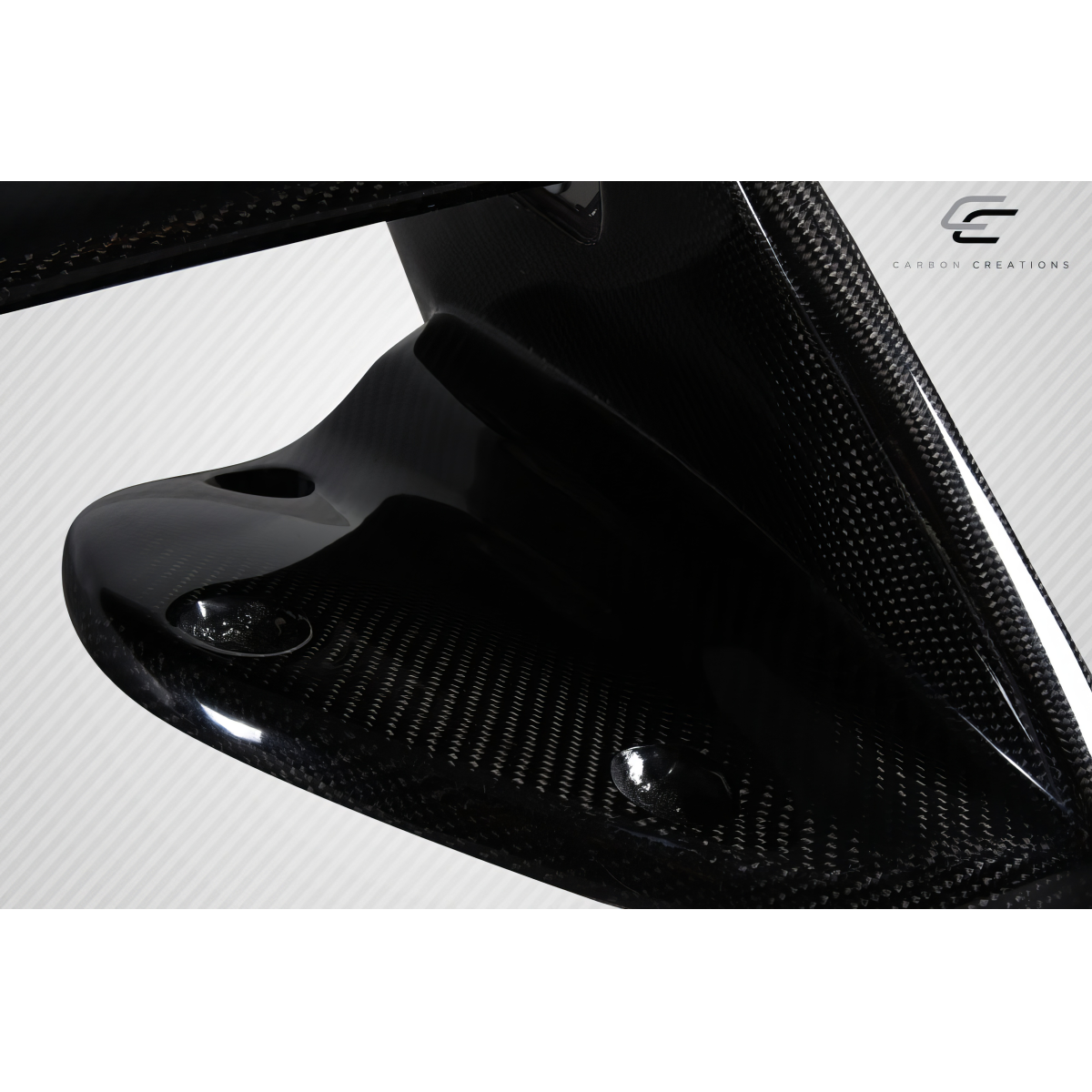 Modify your Chevrolet Cruze 2011 with our Exterior/Wings - Angled view of carbon fiber wing spoiler part