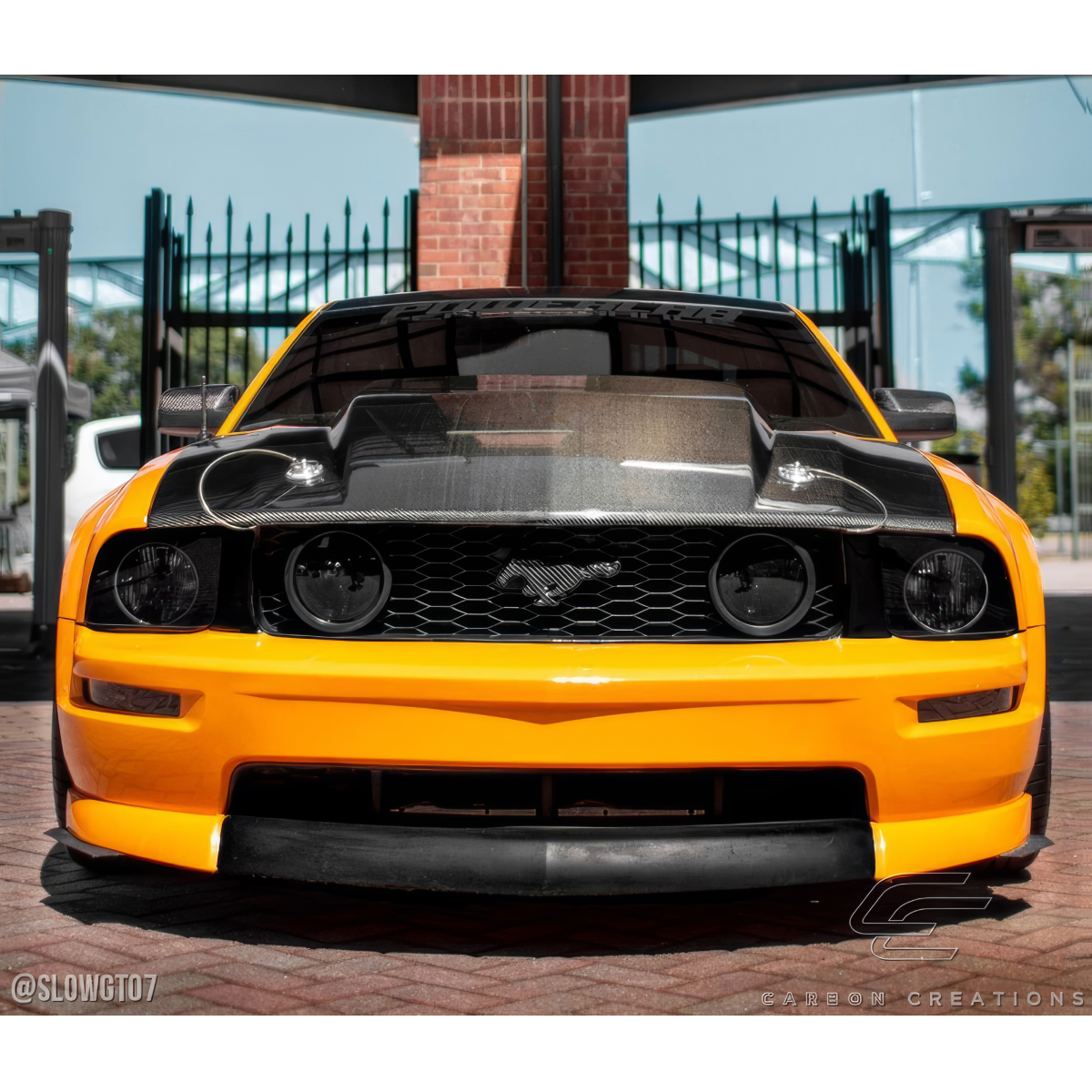 Modify your Ford Mustang 2005 with our Exterior/Hoods - Front angle of a modified Ford Mustang hood
