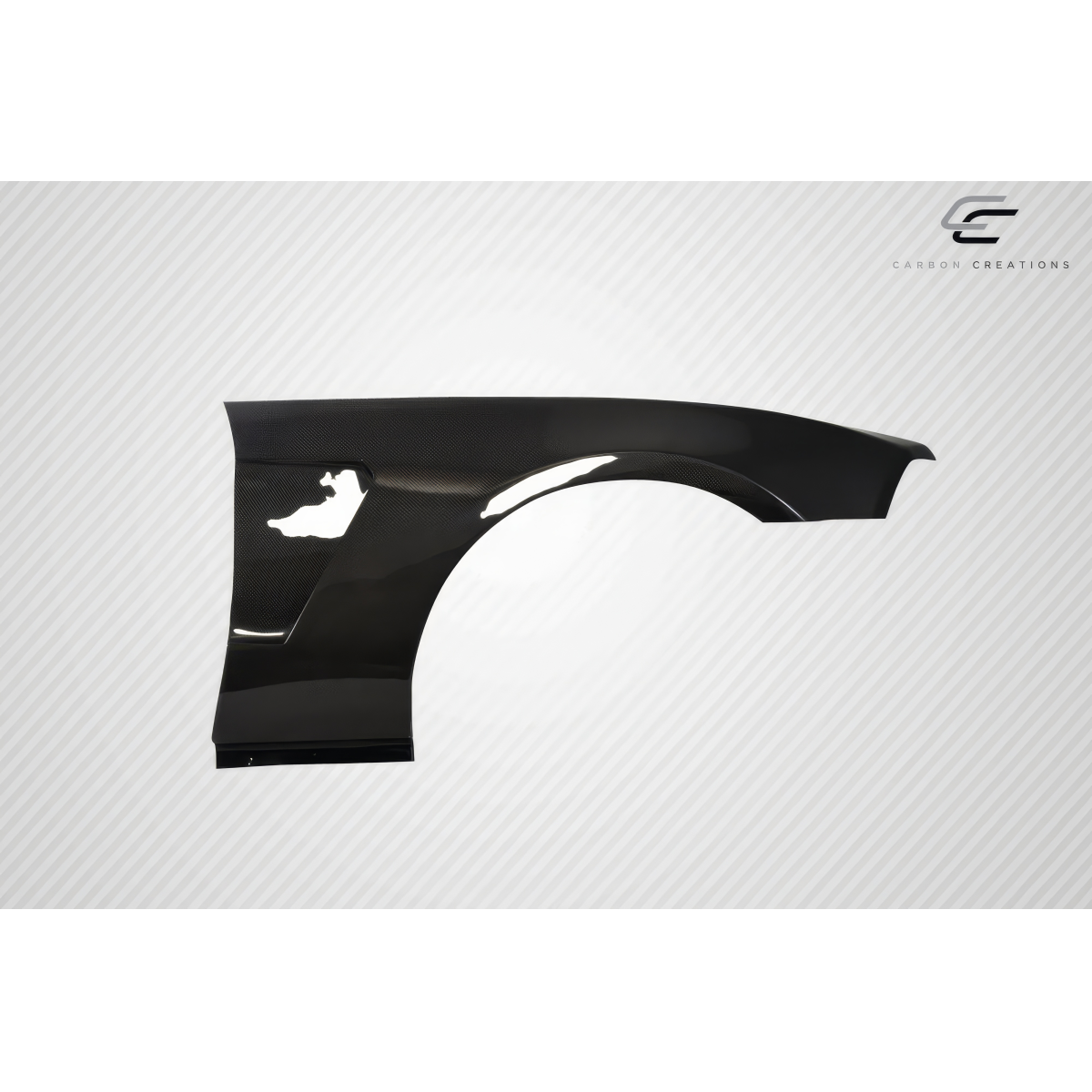 Modify your Ford Mustang 2010 with our Exterior/Fenders - Angled view of the carbon fiber fender part