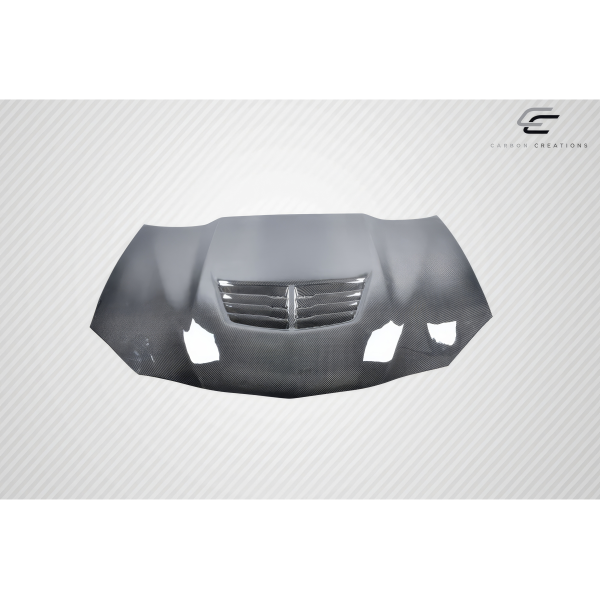 Modify your Pontiac Grand Prix 2004 with our Exterior/Hoods - Front view of a carbon fiber hood with a sleek design