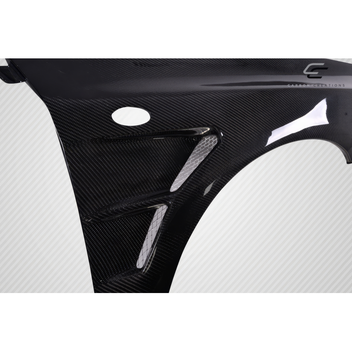 Modify your Subaru Impreza 2006 with our Exterior/Fenders - Angled view showcasing carbon fiber texture and design