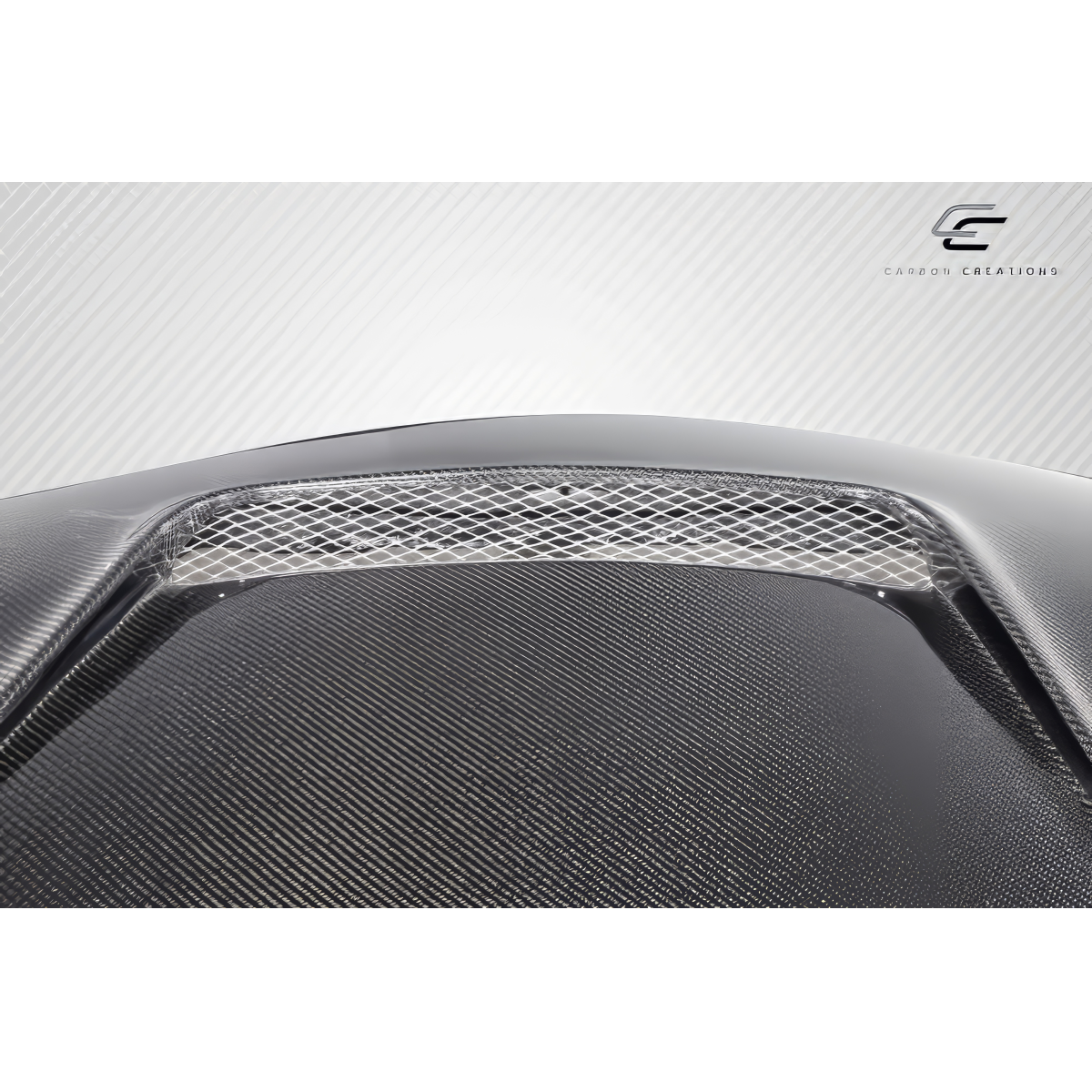 Modify your Toyota Corolla 2014 with our Exterior/Hoods - Angled view of carbon fiber hood vent detail