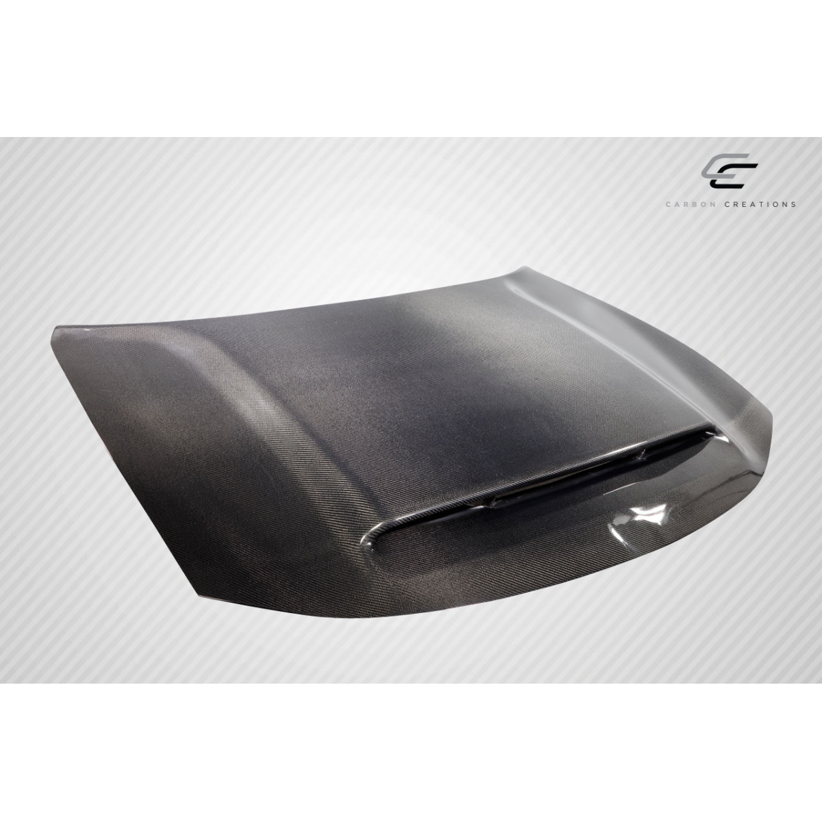 Modify your Dodge Charger 2015 with our Exterior/Hoods - Angled view of carbon fiber hood design