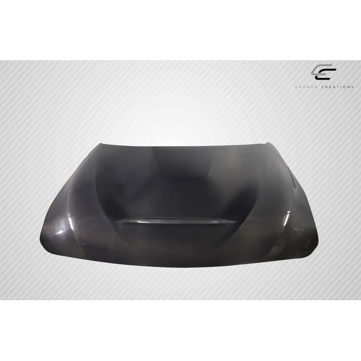 Modify your BMW 3-Series 2012 with our Exterior/Hoods - Front view of carbon fiber hood at slight angle