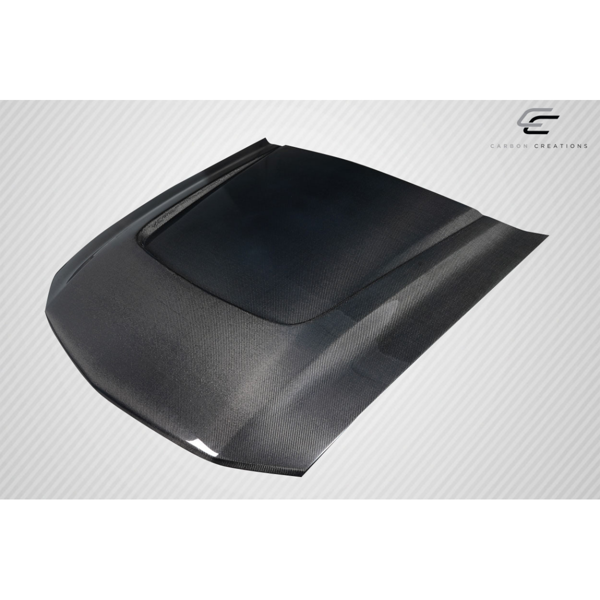 Modify your Ford Mustang 2005 with our Exterior/Hoods - Top view of carbon fiber hood at a slight angle