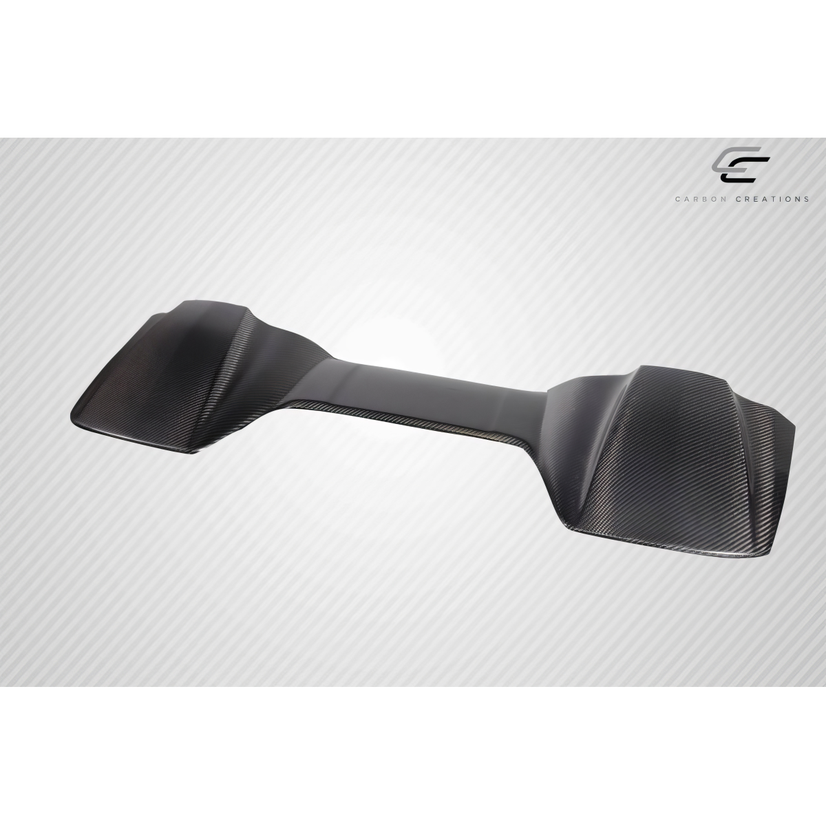 Modify your Chevrolet Corvette 2014 with our Exterior/Tonneau Covers - Angled view of a carbon fiber tonneau cover