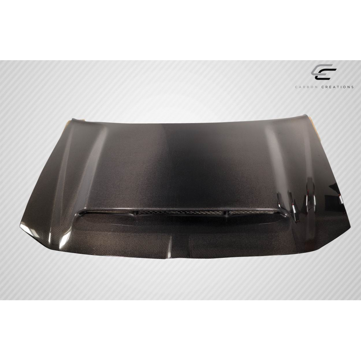 Modify your Dodge Magnum 2005 with our Exterior/Hoods - The angle is mostly top-down showing the hood design