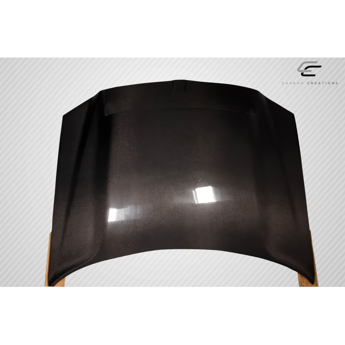Modify your Dodge Magnum 2005 with our Exterior/Hoods - Top down view of car hood at slight angle