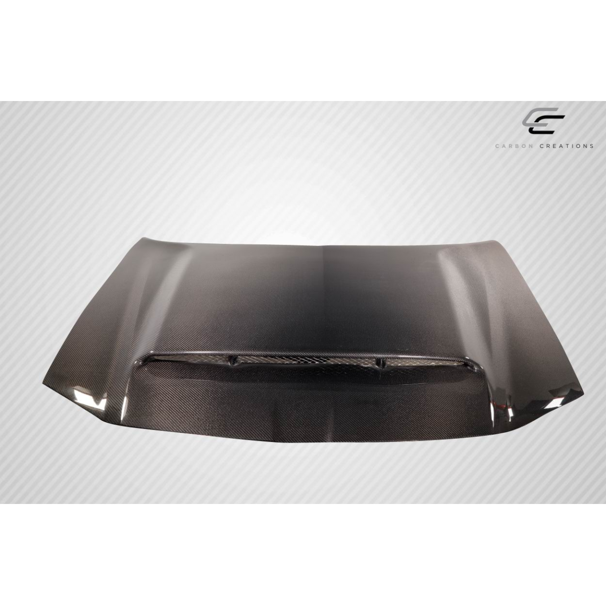 Modify your Chrysler 300 2011 with our Exterior/Hoods - Angled view showing the carbon fiber hood design