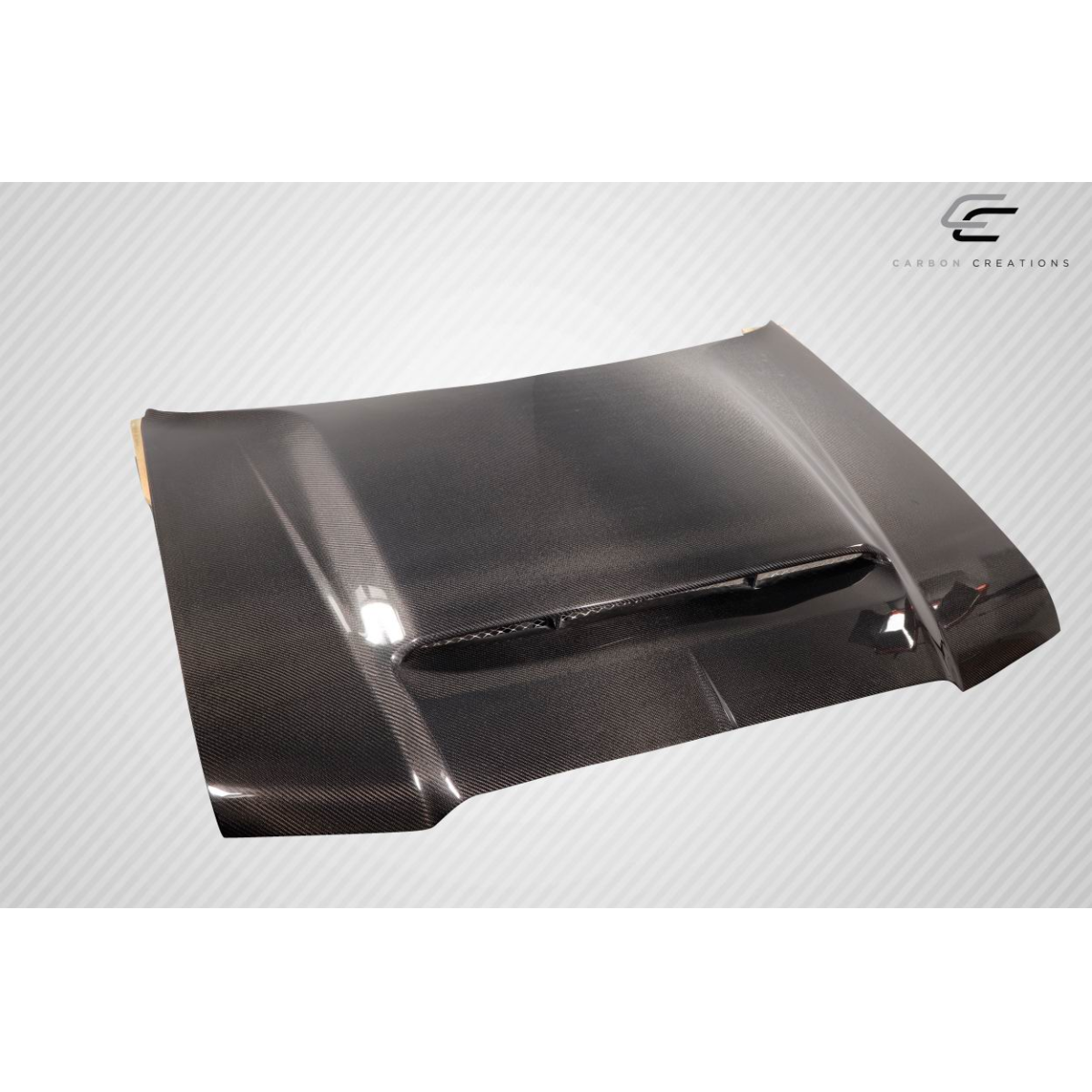 Modify your Chrysler 300 2005 with our Exterior/Hoods - Part viewed from a slightly elevated front angle